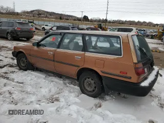 1989 Toyota Camry z VIN JT2SV21W5K0240987, wystawiony jako Copart lot #42248385 z przebiegiem 246 651 mil mil oraz Czysty tytuł • Clean title. Historia ofert i sprzedaży dostępna na DreamBid. Obrazek 2.