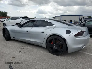 2012 Fisker Karma EcoChic z VIN YH4K16AAXCA000205, wystawiony jako Copart lot #73345464 z przebiegiem 103 346 mil mil oraz Tytuł czysty. Historia ofert i sprzedaży dostępna na DreamBid. Obrazek 2.