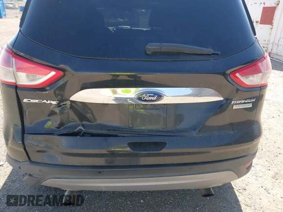 2014 Ford Escape Titanium with VIN 1FMCU0JX6EUB49652, listed as a IAAI auction lot 42136494 with 195,108 mi miles. Bid and sale history available at carsss.com. Image 6.