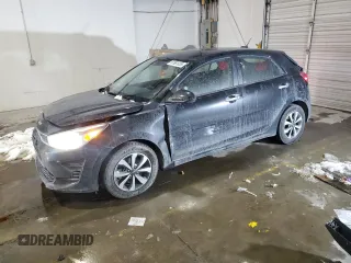 2023 Kia Rio S with VIN 3KPA25AD7PE511848, listed as a Copart auction lot 87881035 with 68,370 mi miles and Salvage Title. Bid and sale history available at DreamBid. Image 1.