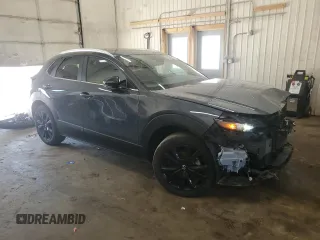 2023 Mazda CX-30 S Preferred with VIN 3MVDMBCM0PM575057, listed as a Copart auction lot 63506665 with 47,556 mi miles and Salvage title. Bid and sale history available at DreamBid. Image 4.