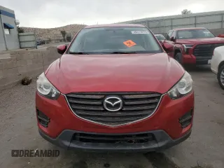 2016 Mazda CX-5 Sport with VIN JM3KE2BY4G0711291, listed as a Copart auction lot 46513875 with 83,319 mi miles and Clean Title. Bid and sale history available at carsss.com. Image 5.