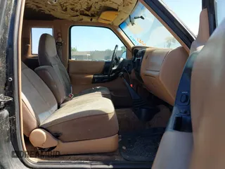 1995 Ford Ranger Splash z VIN 1FTCR14U4SPA42901, wystawiony jako IAAI lot #42497056 z przebiegiem 251 549 mil mil oraz . Historia ofert i sprzedaży dostępna na DreamBid. Obrazek 5.