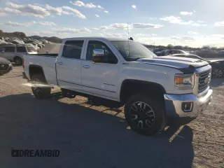 2017 GMC Sierra 2500HD SLT with VIN 1GT12TEY3HF249710, listed as a Copart auction lot 80008164 with 136,002 mi miles and Salvage Title. Bid and sale history available at carsss.com. Image 4.