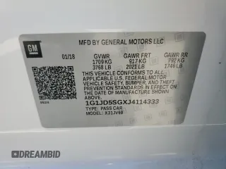 2018 Chevrolet Sonic LT with VIN 1G1JD5SGXJ4114333, listed as a Copart auction lot 60849815 with 44,074 mi miles and Salvage title. Bid and sale history available at DreamBid. Image 12.