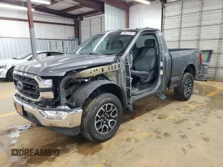 2021 Ford F-150 XL with VIN 1FTMF1EP7MKE58611, listed as a Copart auction lot 56912955 with 30,850 mi miles and Salvage title. Bid and sale history available at DreamBid. Image 1.