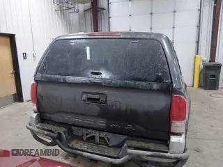 2016 Toyota Tacoma SR5 with VIN 3TMDZ5BNXGM009423, listed as a IAAI auction lot 41008068 with 107,426 mi miles and . Bid and sale history available at DreamBid. Image 16.