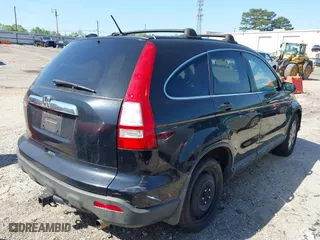 2008 Honda CR-V EX with VIN 3CZRE38598G703477, listed as a IAAI auction lot 42038329 with 311,566 mi miles. Bid and sale history available at carsss.com. Image 4.