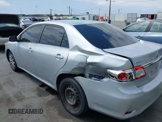 2013 Toyota Corolla L with VIN 2T1BU4EE9DC948109, listed as a IAAI auction lot 42136011 with 166,663 mi miles and . Bid and sale history available at DreamBid. Image 6.