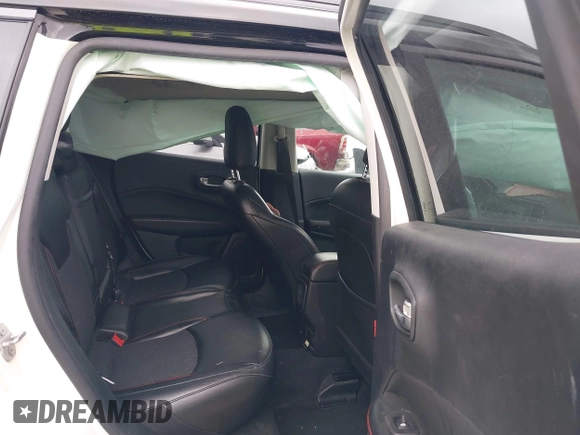 2020 Jeep Compass Trailhawk z VIN 3C4NJDDB6LT126585, wystawiony jako IAAI lot #42210794 z przebiegiem 132 220 mil mil oraz . Historia ofert i sprzedaży dostępna na DreamBid. Obrazek 8.