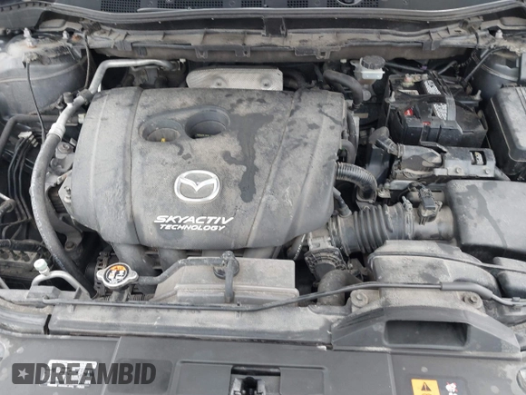 2015 Mazda CX-5 Grand Touring with VIN JM3KE4DY0F0479229, listed as a IAAI auction lot 41838381 with 139,843 mi miles. Bid and sale history available at carsss.com. Image 10.