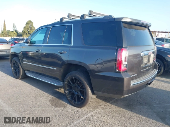 2015 GMC Yukon Denali z VIN 1GKS1CKJ7FR566419, wystawiony jako IAAI lot #41948825 z przebiegiem 235 037 mil mil oraz . Historia ofert i sprzedaży dostępna na DreamBid. Obrazek 3.