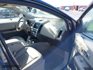2007 Ford Edge SEL with VIN 2FMDK38C27BB71610, listed as a IAAI auction lot 41214654 with 128,594 mi miles. Bid and sale history available at carsss.com. Image 5.
