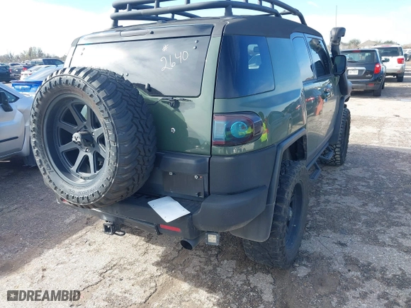 2014 Toyota FJ Cruiser with VIN JTEBU4BFXEK192640, listed as a IAAI auction lot 41349553 with 49,308 mi miles. Bid and sale history available at carsss.com. Image 4.