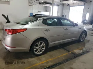 2011 Kia Optima EX z VIN KNAGN4A73B5168902, wystawiony jako Copart lot #59569365 z przebiegiem 160 297 mil mil oraz Szkoda całkowita • Salvage title. Historia ofert i sprzedaży dostępna na DreamBid. Obrazek 3.