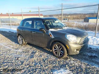 2013 MINI Cooper Countryman with VIN WMWZB3C58DWM31146, listed as a IAAI auction lot 41423661 with 97,505 mi miles. Bid and sale history available at carsss.com. Image 1.
