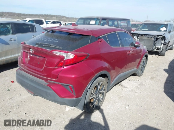 2018 Toyota C-HR XLE with VIN NMTKHMBX3JR059057, listed as a IAAI auction lot 41810801 with 124,246 mi miles. Bid and sale history available at carsss.com. Image 4.