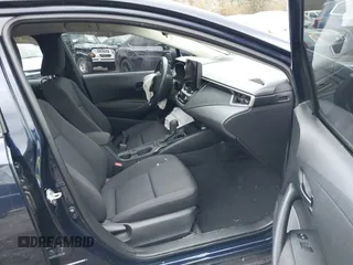 2023 Toyota Corolla LE with VIN 5YFB4MDEXPP032982, listed as a IAAI auction lot 41728893 with 21,887 mi miles and . Bid and sale history available at DreamBid. Image 5.