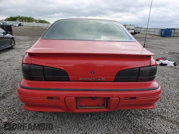 1994 Pontiac Bonneville с VIN 1G2HX52L3R4224473, выставлен на аукционе Copart как лот 55742765 с пробегом 145 767 миль миль и Списание • Salvage title. История ставок и продаж доступна на DreamBid. Изображение 6.