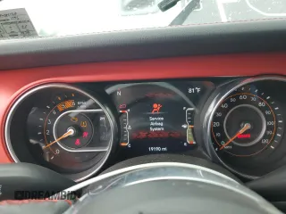 2023 Jeep Wrangler Rubicon with VIN 1C4JJXFM3PW585720, listed as a Copart auction lot 59776305 with 19,190 mi miles and Salvage title. Bid and sale history available at DreamBid. Image 9.