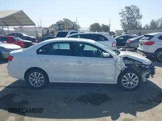 2012 Volkswagen Jetta SE with VIN 3VWDP7AJ3CM412988, listed as a IAAI auction lot 42528977 with 57,175 mi miles and . Bid and sale history available at DreamBid. Image 14.