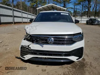 2023 Volkswagen Tiguan SE R-Line Black with VIN 3VVCB7AX6PM001044, listed as a Copart auction lot 47365565 with 20,059 mi miles and Salvage title. Bid and sale history available at DreamBid. Image 5.