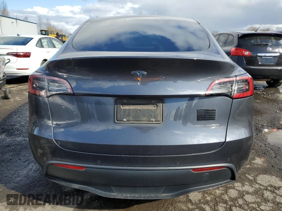 2021 Tesla Model Y Long Range with VIN 5YJYGAEE4MF200914, listed as a Copart auction lot 46946845 with 116,370 mi miles and Salvage Title. Bid and sale history available at DreamBid. Image 6.