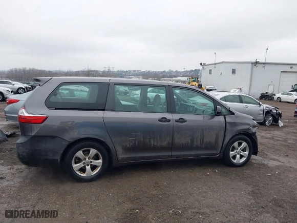 2015 Toyota Sienna L with VIN 5TDZK3DC9FS582287, listed as a IAAI auction lot 41465131 with NaN miles. Bid and sale history available at carsss.com. Image 14.