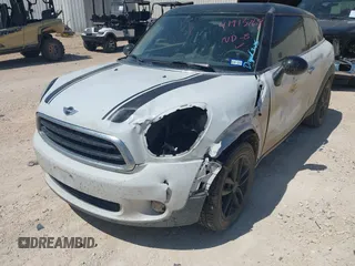 2015 MINI Paceman z VIN WMWSS1C59FWN94932, wystawiony jako IAAI lot #41913769 z przebiegiem 108 678 mil mil oraz . Historia ofert i sprzedaży dostępna na DreamBid. Obrazek 6.
