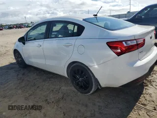 2015 Kia Rio LX with VIN KNADM4A38F6436457, listed as a Copart auction lot 68740994 with 87,474 mi miles and Salvage Title. Bid and sale history available at carsss.com. Image 2.