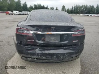 2017 Tesla Model S 100D с VIN 5YJSA1E21HF188840, выставлен на аукционе Copart как лот 62683685 с пробегом 90 101 миль миль и Списание • Salvage title. История ставок и продаж доступна на DreamBid. Изображение 6.