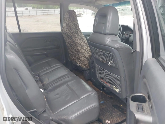 2003 Honda Pilot EX with VIN 2HKYF18523H543302, listed as a IAAI auction lot 42052364 with 331,473 mi miles. Bid and sale history available at carsss.com. Image 8.