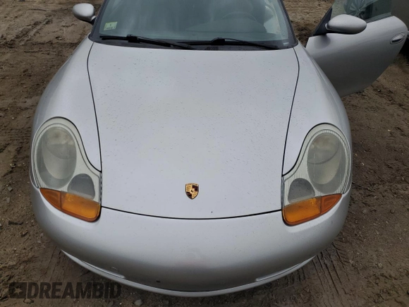 1999 Porsche 911 z VIN WP0AA2992XS621138, wystawiony jako Copart lot #49492405 z przebiegiem 148 064 mil mil oraz Czysty tytuł • Clean title. Historia ofert i sprzedaży dostępna na DreamBid. Obrazek 11.