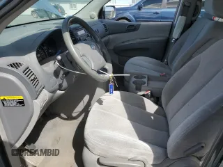 2007 Kia Sedona LX with VIN KNDMB233776175608, listed as a Copart auction lot 69321964 with 198,560 mi miles and Salvage Title. Bid and sale history available at carsss.com. Image 7.