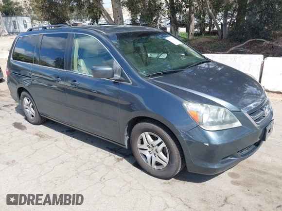2005 Honda Odyssey EX-L with VIN 5FNRL38725B084980, listed as a IAAI auction lot 41917012 with 134,685 mi miles. Bid and sale history available at carsss.com. Image 1.