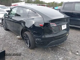 2025 Tesla Model Y Long Range with VIN 7SAYGDEDXSA349480, listed as a IAAI auction lot 41492740 with 1,486 mi miles and . Bid and sale history available at DreamBid. Image 3.