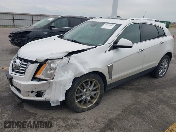 2013 Cadillac SRX Performance Collection z VIN 3GYFNHE35DS569528, wystawiony jako IAAI lot #42329652 z przebiegiem 97 184 mil mil oraz . Historia ofert i sprzedaży dostępna na DreamBid. Obrazek 2.