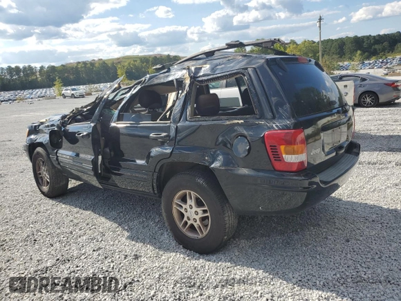 2000 Jeep Grand Cherokee Laredo with VIN 1J4G258S5YC193875, listed as a Copart auction lot 74731704 with Not provided miles and Salvage title. Bid and sale history available at DreamBid. Image 2.