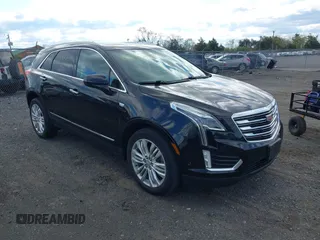 2019 Cadillac XT5 Premium Luxury AWD z VIN 1GYKNFRS7KZ171791, wystawiony jako IAAI lot #42039131 z przebiegiem 116 575 mil mil oraz . Historia ofert i sprzedaży dostępna na DreamBid. Obrazek 1.