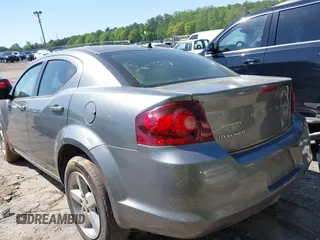 2013 Dodge Avenger SE with VIN 1C3CDZAB1DN658140, listed as a IAAI auction lot 41998306 with 215,548 mi miles. Bid and sale history available at carsss.com. Image 3.