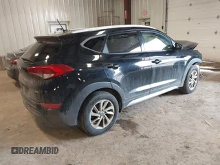 2017 Hyundai Tucson SE with VIN KM8J3CA42HU293608, listed as a IAAI auction lot 41228892 with 140,229 mi miles. Bid and sale history available at carsss.com. Image 4.