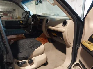 2004 Ford Expedition Eddie Bauer z VIN 1FMRU17W54LA37458, wystawiony jako IAAI lot #42155355 z przebiegiem 190 605 mil mil oraz . Historia ofert i sprzedaży dostępna na DreamBid. Obrazek 5.