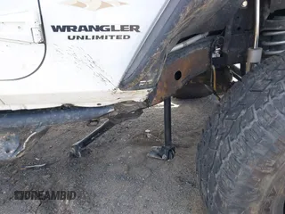 2014 Jeep Wrangler Unlimited Sahara with VIN 1C4BJWEG6EL203866, listed as a IAAI auction lot 41846091 with 105,296 mi miles. Bid and sale history available at carsss.com. Image 6.