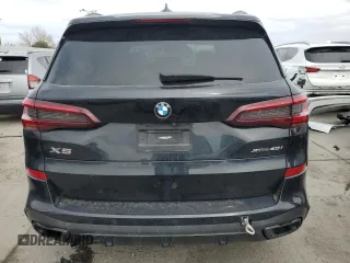 2021 BMW X5 xDrive40i with VIN 5UXCR6C05M9E56869, listed as a Copart auction lot 49317665 with 50,229 mi miles and Salvage title. Bid and sale history available at DreamBid. Image 6.