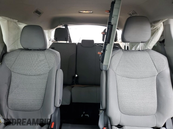 2021 Toyota Sienna LE z VIN 5TDBSKFC4MS022005, wystawiony jako Copart lot #50769965 z przebiegiem 108 694 mil mil oraz Szkoda całkowita • Salvage title. Historia ofert i sprzedaży dostępna na DreamBid. Obrazek 10.