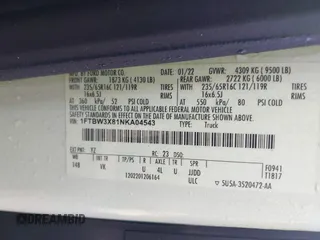2022 Ford Transit Cargo with VIN 1FTBW3X81NKA04543, listed as a IAAI auction lot 41763336 with 128,518 mi miles. Bid and sale history available at carsss.com. Image 9.