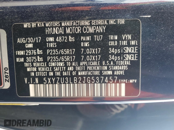 2018 Hyundai Santa Fe 2.4L z VIN 5XYZU3LB2JG537457, wystawiony jako Copart lot #56800005 z przebiegiem 97 344 mil mil oraz Szkoda całkowita • Salvage title. Historia ofert i sprzedaży dostępna na DreamBid. Obrazek 13.