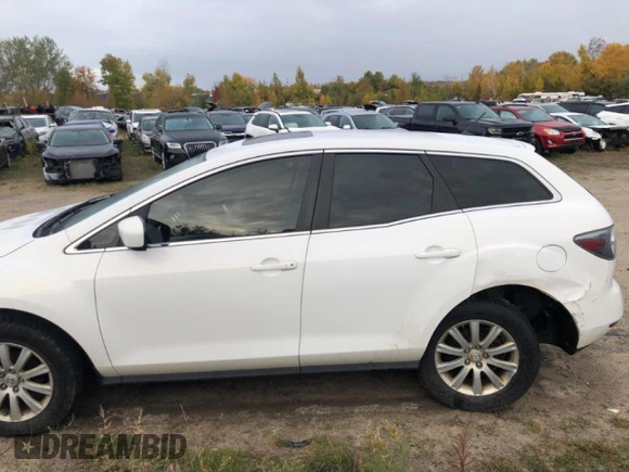 2012 Mazda CX-7 i Sport z VIN JM3ER2B57C0422357, wystawiony jako Copart lot #75446634 z przebiegiem 111 443 mil mil oraz Czysty tytuł • Clean title. Historia ofert i sprzedaży dostępna na DreamBid. Obrazek 7.