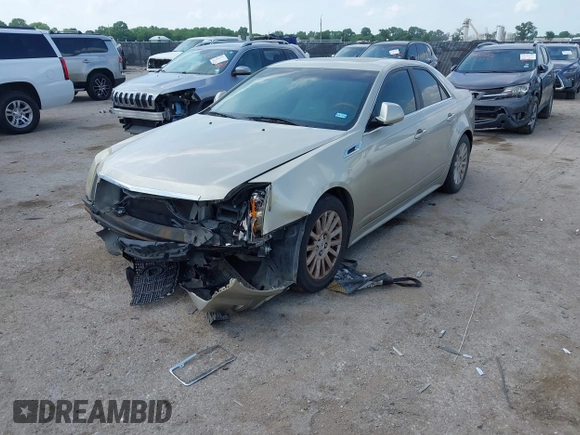2013 Cadillac CTS Luxury with VIN 1G6DE5E55D0120843, listed as a IAAI auction lot 42145982 with 147,127 mi miles and . Bid and sale history available at DreamBid. Image 2.