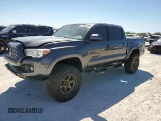 2018 Toyota Tacoma SR5 with VIN 3TMAZ5CNXJM057187, listed as a Copart auction lot 48705665 with 120,057 mi miles and Salvage Title. Bid and sale history available at DreamBid. Image 1.